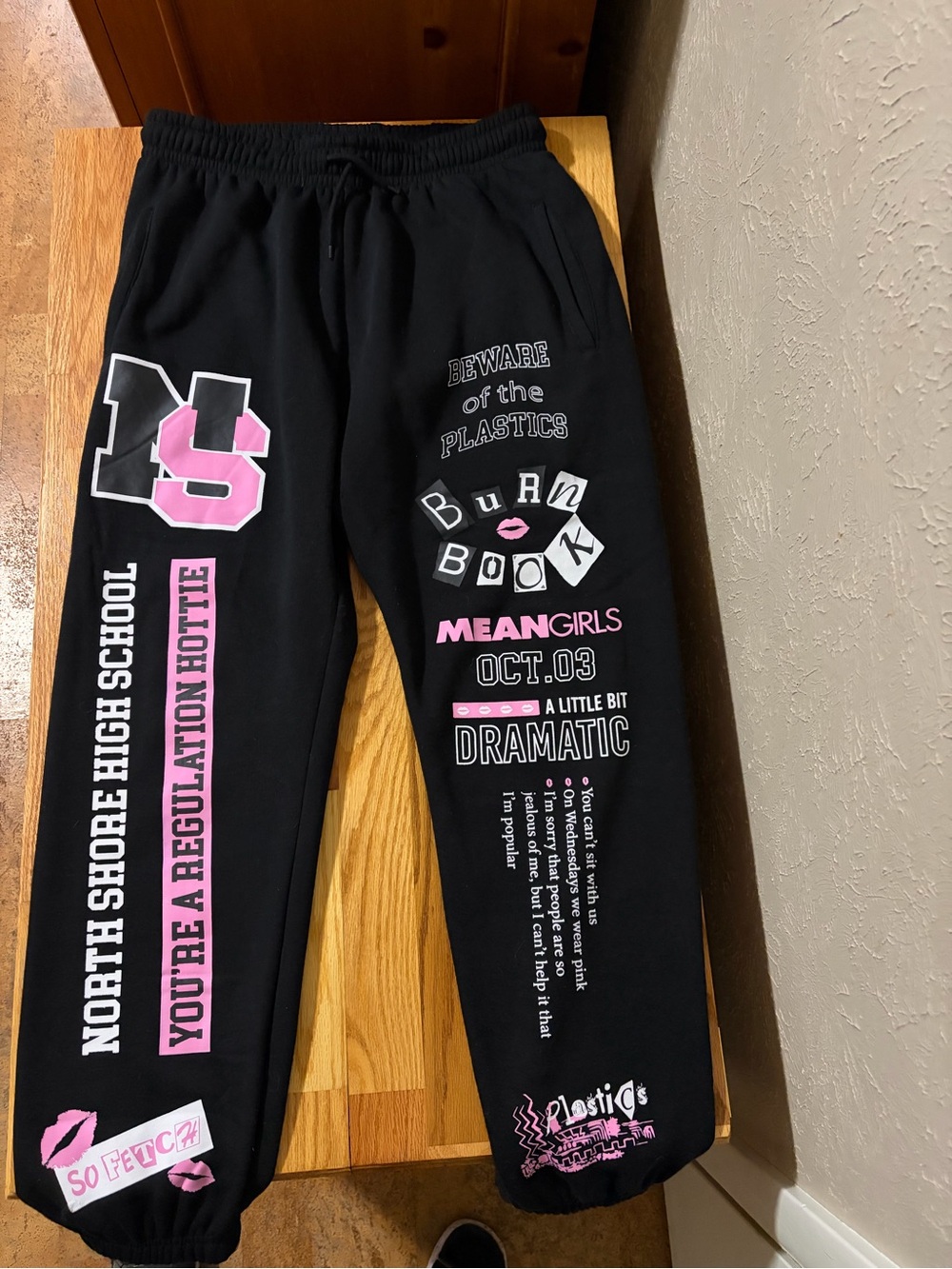 Women’s Black and Pink Graphic Jogger Pants - Mean Girls Inspired
